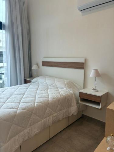 Ένα ή περισσότερα κρεβάτια σε δωμάτιο στο Home, spa and working