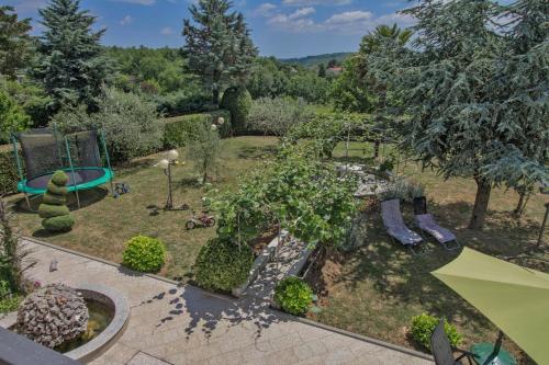 an aerial view of a garden with a playground at Lucia in Gračišće - Istrien in Gračišće