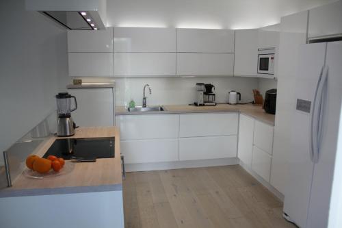 Η κουζίνα ή μικρή κουζίνα στο Snow White Villa Nordic Design & Sauna