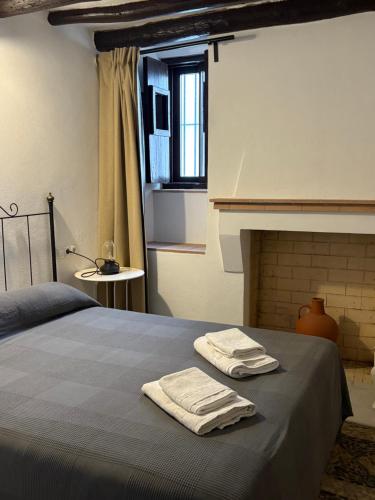 Postel nebo postele na pokoji v ubytování Casa Plaza Vieja