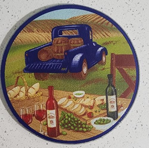 a plate with a picture of a car and wine bottles at Magic City IN THE HEART OF MIAMI in Miami