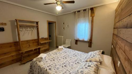 Postel nebo postele na pokoji v ubytování Hostal Ochoa