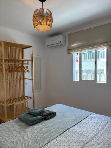 Ένα ή περισσότερα κρεβάτια σε δωμάτιο στο La Siesta Hostel