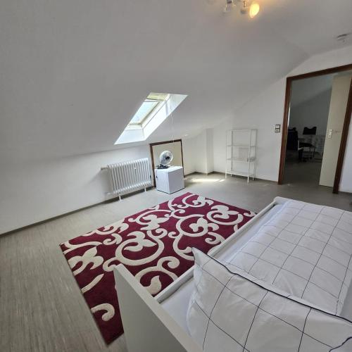 Postel nebo postele na pokoji v ubytování Freundliches Privatzimmer mit Gemeinschaftsküche und Gemeinschaftsbad