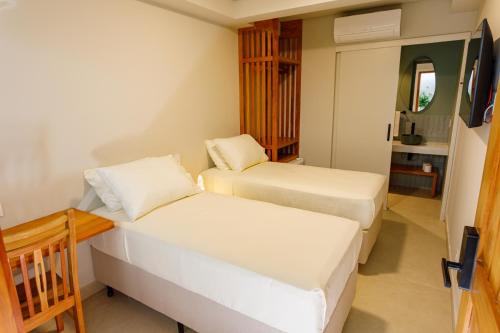 Кровать или кровати в номере Casa Savana Suítes
