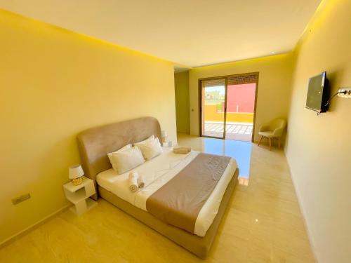 Postel nebo postele na pokoji v ubytování Sublime Villa avec Piscine et Jardin à Marrakech
