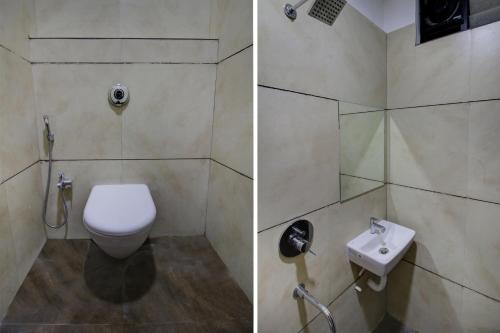 a bathroom with a toilet and a sink at Hotel O The Shloka in Bhopal