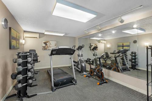 a gym with exercise equipment in a room at Quality Inn & Suites 5585 Ambler Drive Mississauga Ontario in Mississauga