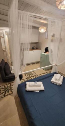 Кровать или кровати в номере La Pigna Blu