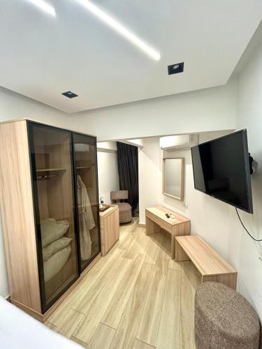 TV a/nebo společenská místnost v ubytování Platinum pyramids View INN