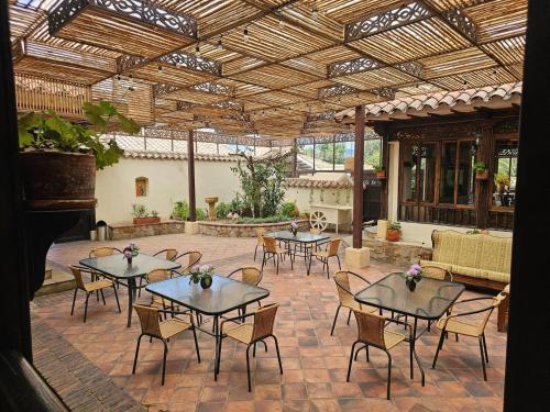 Um restaurante ou outro lugar para comer em Posada Corinto Paipa