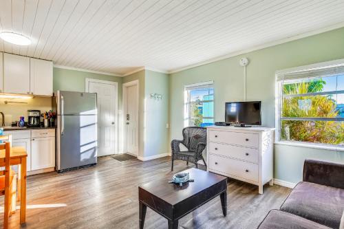 a living room with a couch and a table at Fisherman's Bungalow in Conch Key