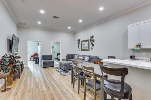 a kitchen and living room with a table and chairs at Sebring Retreat with Direct Golf Course Access! in Sebring
