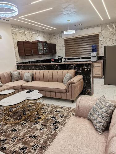 Η κουζίνα ή μικρή κουζίνα στο دار عدنان للشقق الفندقية المفروشة