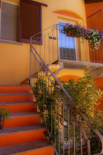 a set of stairs leading to a house at BelSorrisoVarese - Elegance City Residence Private Parking -Reservation Required- in Varese