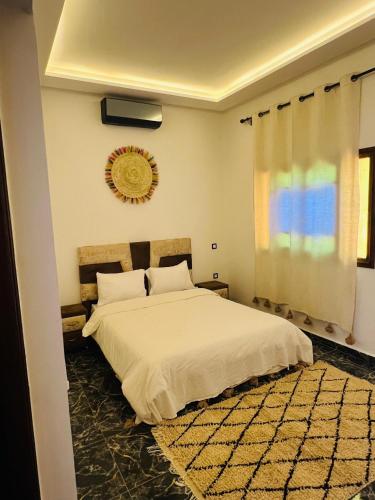 Katil atau katil-katil dalam bilik di Excellente Villa A Proximité De Marrakech