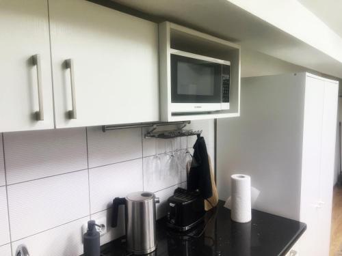 Η κουζίνα ή μικρή κουζίνα στο Studio 10 min walk from old town