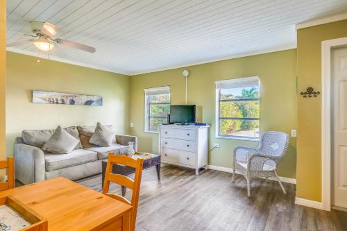 a living room with a couch and a table at Fisherman's Hideaway in Conch Key