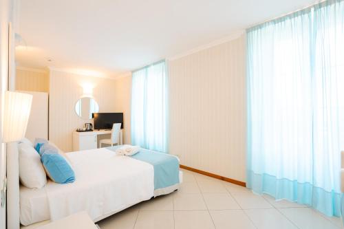 Katil atau katil-katil dalam bilik di Hotel Nazionale