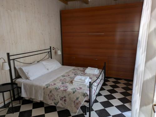 Postel nebo postele na pokoji v ubytování La Casa a Corte