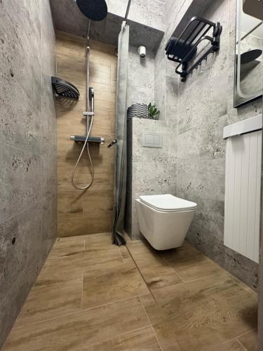 Koupelna v ubytování Apartament K&M w Lubniewicach