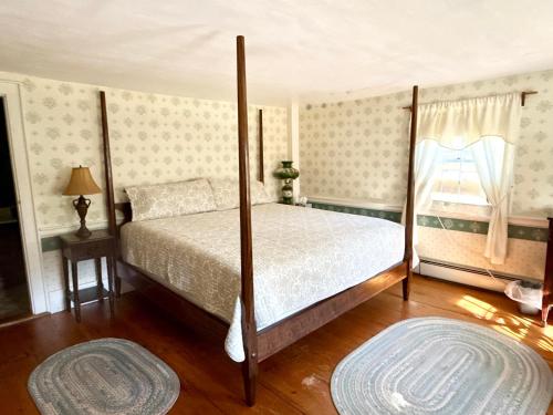 Postel nebo postele na pokoji v ubytování Colonel Spencer Inn