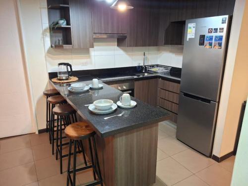 イキケにあるDepartamento a pasos de PLAYA BRAVA! Cavanchaのギャラリーの写真