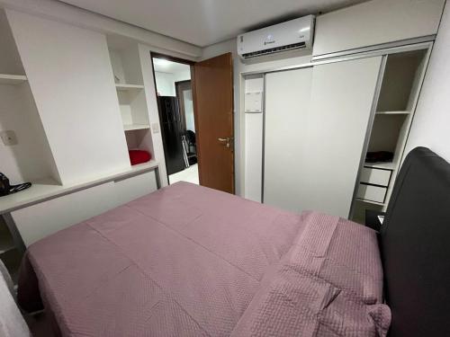 Postel nebo postele na pokoji v ubytování Conforto beira mar Flamboyant