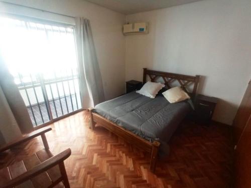 Postel nebo postele na pokoji v ubytování Amplio y cómodo en la mejor ubicación de la Ciudad de Mendoza