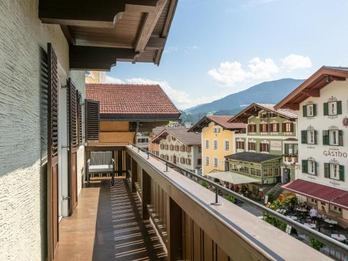 a view from a balcony of a town with buildings at Hopfgarten Alpin Living Top 3 und 4 in Hopfgarten im Brixental
