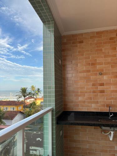 Μπαλκόνι ή βεράντα στο Apartamento com vista para o mar no centro