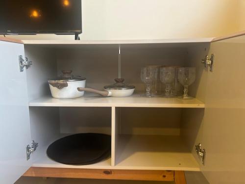 Dapur atau dapur kecil di Casa 04 - Casa com 2 quartos, sendo uma suíte localizada próximo a rodoviária e o aeroporto