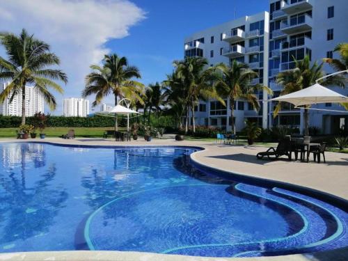 Bazén v ubytování Your Apartment in Playa Blanca Resort nebo v jeho okolí