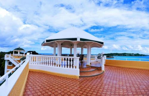 a gazebo on the deck of a cruise ship at Breakfast at Monaco - Palais Boracay in Boracay