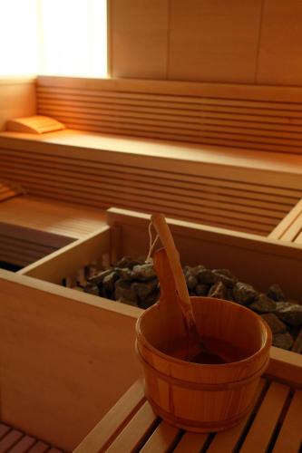 a wooden bowl sitting in a drawer with a bowl at Là Di Moret in Udine