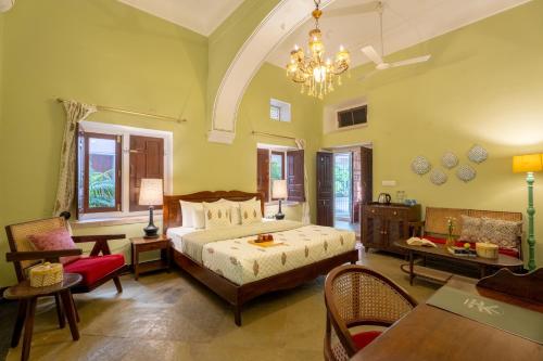Postel nebo postele na pokoji v ubytování Mukam at Kanak Vilas, Jaipur