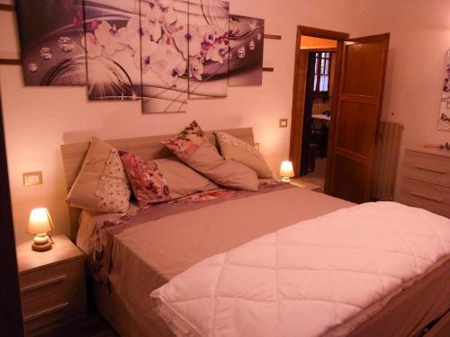 a bedroom with a bed in a room at Home in Garfagnana in Vagli di Sotto