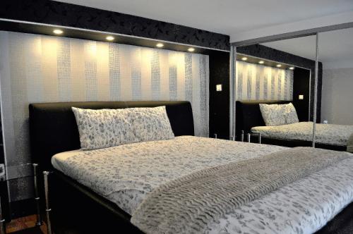 Posteľ alebo postele v izbe v ubytovaní Welcome Budapest Apartments