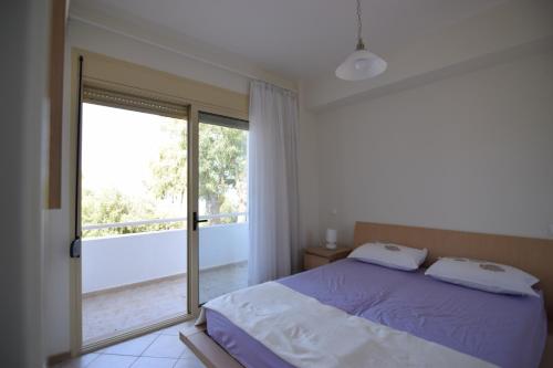 Posteľ alebo postele v izbe v ubytovaní Villa Anemi