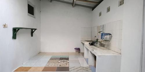 Η κουζίνα ή μικρή κουζίνα στο Green House Homestay