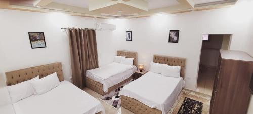 Cama o camas de una habitación en Alaaeldein Golden Pyramids