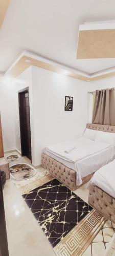 Cama o camas de una habitación en Alaaeldein Golden Pyramids