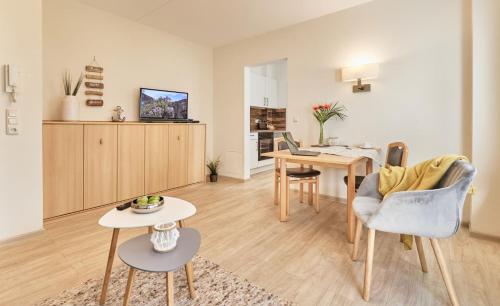 TV a/nebo společenská místnost v ubytování Pamir - 22