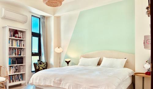 Katil atau katil-katil dalam bilik di 宜蘭-讀好民宿 Read Nice House B&B 電梯民宿