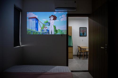 TV a/nebo společenská místnost v ubytování Emly Home Stay Đà Nẵng