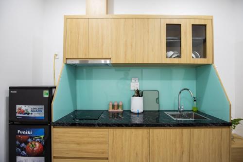 Kuchyň nebo kuchyňský kout v ubytování Emly Home Stay Đà Nẵng