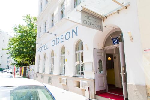 a hotel exterior with a hotel oblivion sign on a building at Very Central, 5 min to city center, Self Check In in Vienna