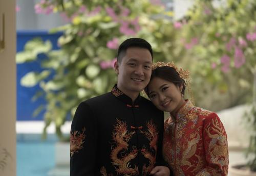 a man and a woman posing for a picture at Kue Hotel Maafushi in Maafushi