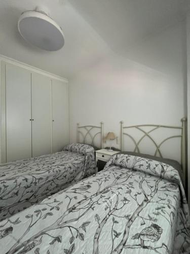 Ένα ή περισσότερα κρεβάτια σε δωμάτιο στο Apartamento en Canet Berenguer Valencia