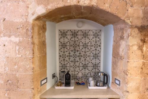 Kuchyň nebo kuchyňský kout v ubytování B&B Ponticello a San Potito